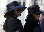 Marcai Shakespeare (left) at her daughter Letisha's funeral